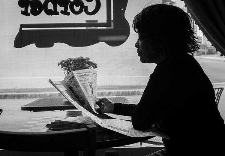 Photo of Rita Dove sitting by a window in 2013.