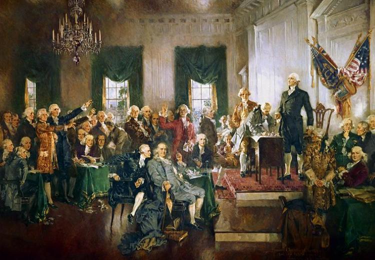 An oil painting of 39 delegates who signed the Constitution in 1787. They are in Independence Hall in Philadelphia; all of the delegates shown are white men.