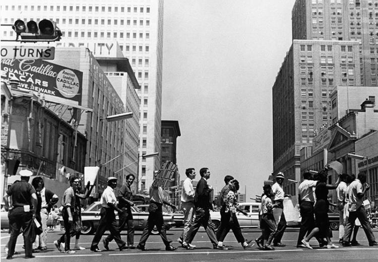 The Newark Community Union Project (NCUP) Police Brutality March across Broad and Market Street in Newark, NJ, 1965.